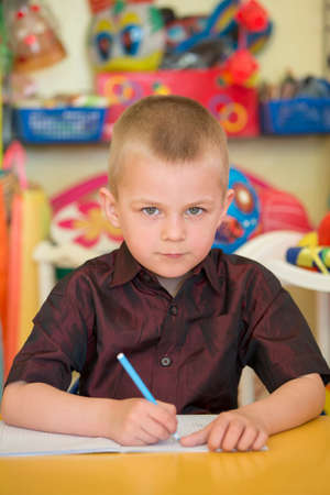 Belarus, the city of Gomil, April 26, 2019. Open day in kindergarten.Child preschooler with book on...