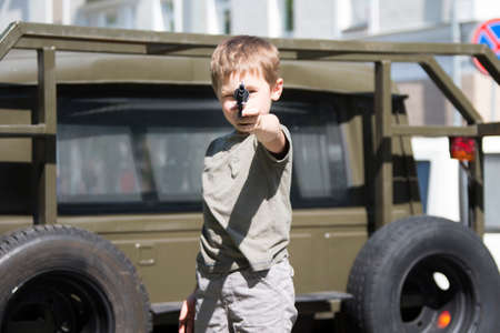 Russian boy with a gun