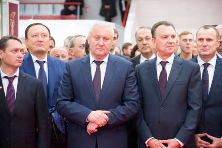 Belarus is the city of Gomel on October 25, 2018. Exhibition of products of national economy.Older men in suits. Politicians.Chiefsのeditorial素材