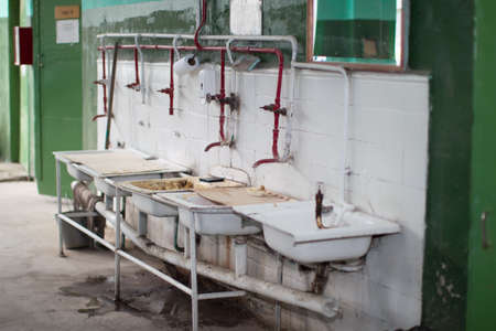 Old washbasins in the factory