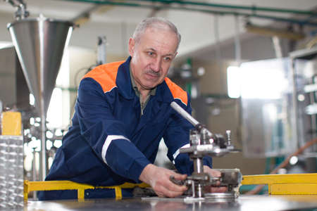 The worker at the factory does the work