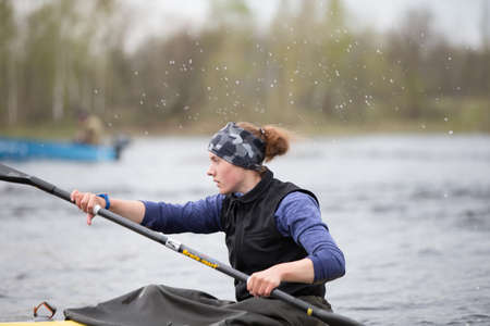 Belarus, Gomel, 25 April 2018. Training in rowing. Female athlete engaged in rowing.Girl in a sports...