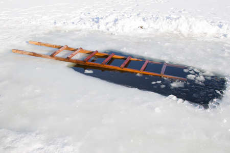 The feast of the baptism of Jesus. Ladder and baptismal ice-hole.