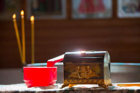 Church supplies for the baptism of the child. The rite of baptism. Adoption of faith.