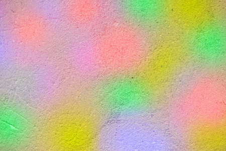 Multi-colored concrete texture with potholes and scratches closeup.