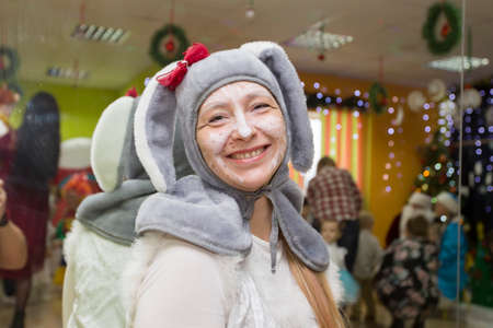 Belarus. the city of Gomil. December 25, 2018. Charitable New Years holiday in the city. A woman in a bunny costume at the Christmas party.のeditorial素材