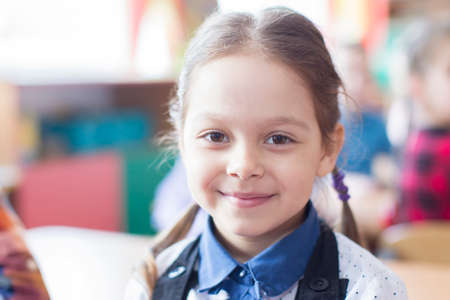 Belarus, the city of Gomil, May 30, 2019. Photosession in kindergarten. Portrait of a preschool girl.のeditorial素材