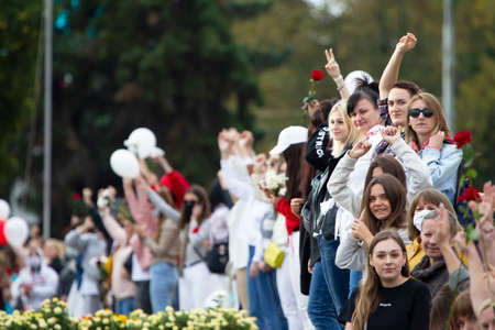 Belarus, Gomel, August 12, 2020. The streets of the city. Peoples protest against Lukashenka. Peaceful rally in Belarus against the dictator. Women at a peaceful protest in Belarus.のeditorial素材