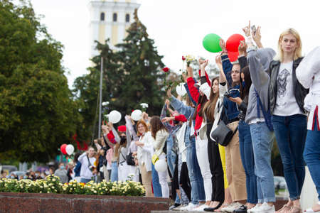 Belarus, Gomel, August 12, 2020. The streets of the city. Peoples protest against Lukashenka. Peaceful rally in Belarus against the dictator. Women at a peaceful protest in Belarus.のeditorial素材