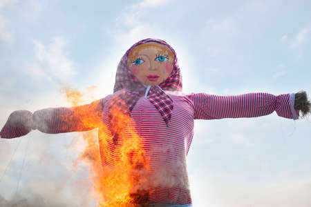 Belarus, the city of Gomil, February 24, 2020. Maslenitsa holiday.Burning Scarecrow at a winter holiday.のeditorial素材
