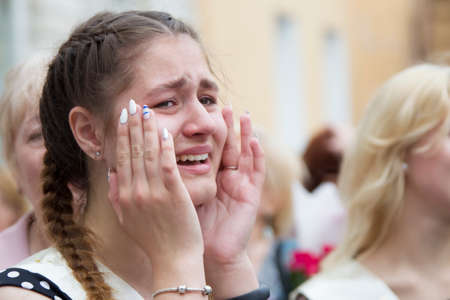 Belarus, the city of Gomel, May 30, 2019. Graduation at school. The girl is crying.