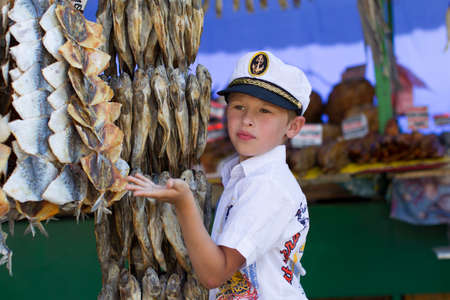 Ukraine. Odessa, August 28, 2018. Central Market.Little boy in a sailor hatのeditorial素材