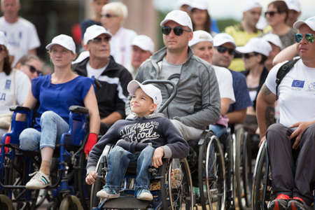 Belarus, the city of Gimel, July 03, 2019. Youth Festival.Marathon Disabled. People in wheelchairs on a city streetのeditorial素材