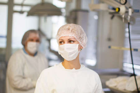 Belarus, Gomel, May 31, 2017. Central Hospital. Operational. A doctor in a masked mask. Nurse in clothes.;のeditorial素材