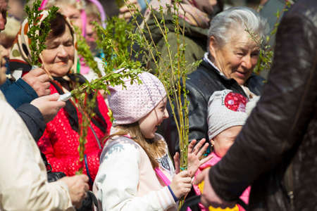 Belarus, Gomel, April 21, 2019. Palm Sunday is a church holiday.people with bouquets of spring...