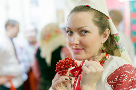 Belarus, Gomel city, November 26, 2016. Rite reconstruction. Portet of a Slavic woman in national costume. Ukrainian or Belarusian.のeditorial素材