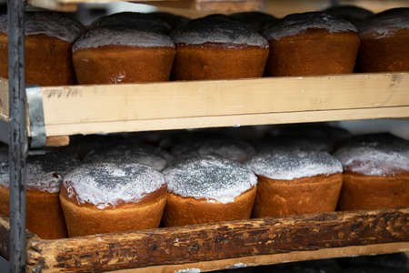 Industrial production of Easter cakes. Easter baked wood pallets