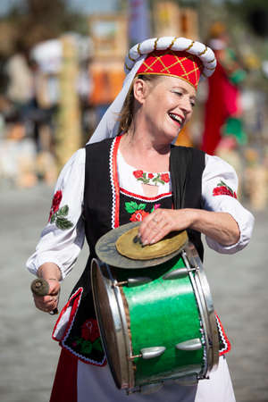 08 29 2020 Belarus, Lyaskovichi. Celebration in the city. Elderly Slavic woman in national dress...