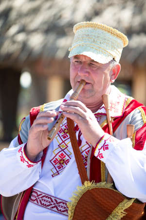 08 29 2020 Belarus, Lyaskovichi. Celebration in the city. An elderly Slavic man in national dress...