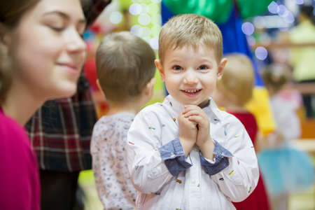 December 25, 2019 Belarus, city of Gomil. City holiday. Happy child claps his hands.