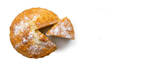 Freshly baked cupcake banner with a cut piece on a white background. Bakery products.の写真素材