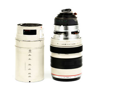 17 08 2020 Belarus, city of Gomil.Disassembled telephoto professional lens on a white background.