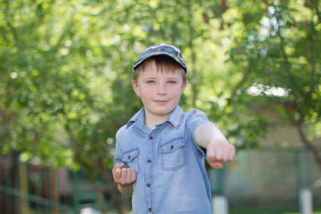Belarus, the city of Gomel, April 04, 2018. The central kindergarten. Open day.A preschooler boy shows a carat reception.のeditorial素材