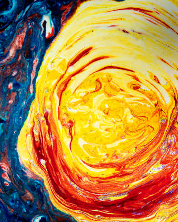 Vertical bright blue acrylic spot with bright yellow. Marble colorful texture. A semicircle smeared with paints that looks like a celestial mantle. Abstract painting.の写真素材