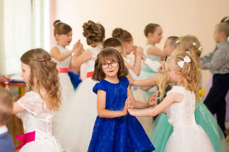 Belarus, the city of Gomil, 26.04.2019 Kindergarten in the city. Cheerful preschool children at the matinee in kindergarten.のeditorial素材