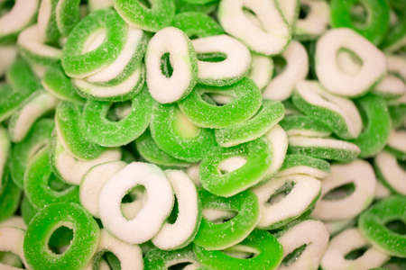 Sweets background. Bright gummy candies close-up. Close-up of colorful jujube background pattern