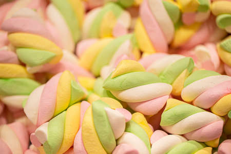 Multicolored candy marshmallows sticks.