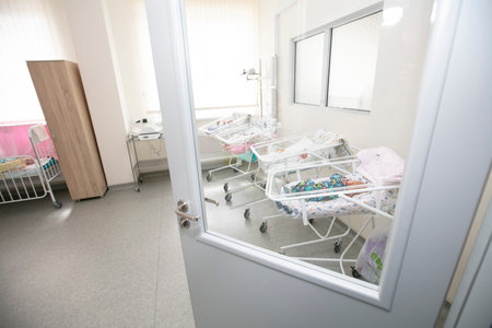 Babies in baby clothes of a hospital for newborns.のeditorial素材
