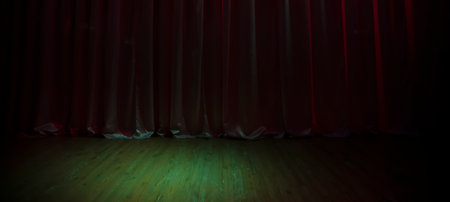 Green dark stage floor and dark purple curtains.の写真素材