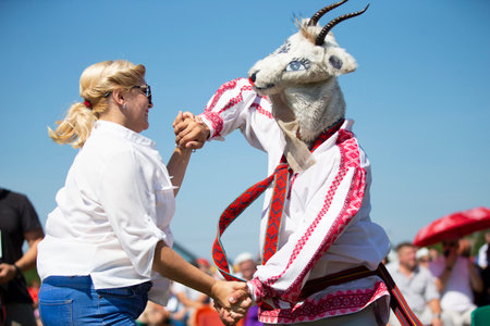 July 31, 2021. Belarus, the village of Avtyuki. Dancing in the village An ethnic dance with a goat that is used in many Slavic cultures.のeditorial素材