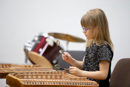 May 21, 2021 city of Gomil. Holiday at the music school. The girl plays the ethnic instrument...