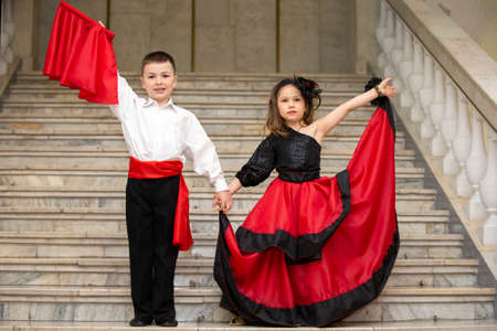 Belarus, city of Gomel, May 21, 2021 Children's holiday in the city. Boy and girl in national Spanish clothes.の写真素材