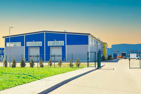 Modern industrial building against the blue sky.
