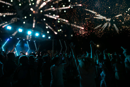 A crowd of people came to the holiday, a fireworks festival, explosions of pyrotechnic charges,...