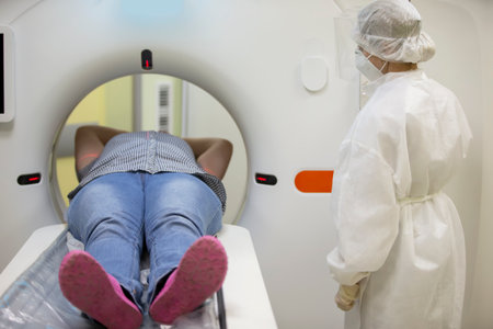 The patient is being scanned on an MRI machine.の写真素材