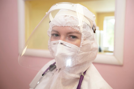A doctor in a protective suit during an epidemic. pandemic, coronavirus.の写真素材
