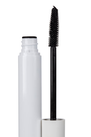 Closeup mascara bottle and brush. Black mascara and tube isolated on white background.の写真素材