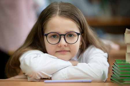 Portrait of a middle-aged schoolgirl with glasses.の写真素材