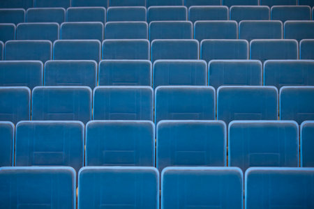 A row of empty chairs in the auditorium of the cinema.の写真素材
