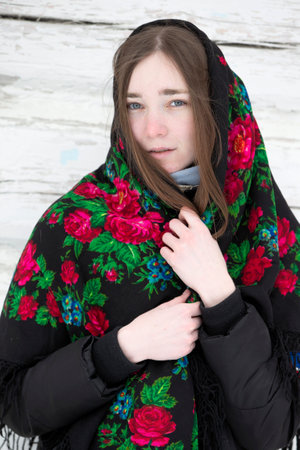 March 13, 2021. Belarus, Nadezhda village, Maslyanitsa holiday.Portrait of a beautiful girl in a...