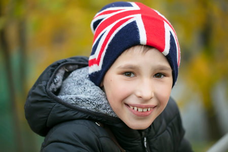 Happy child in a hat with the British flag.の写真素材