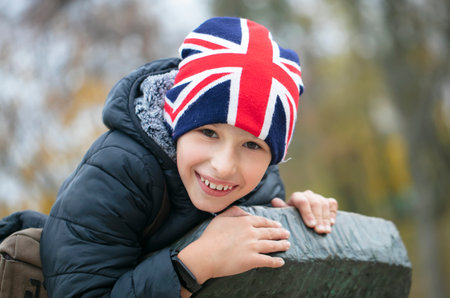 Happy child in a hat with the British flag.の写真素材