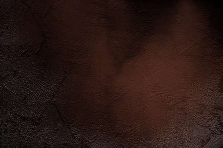 Beautiful dark brown texture plaster background with glitter.の写真素材