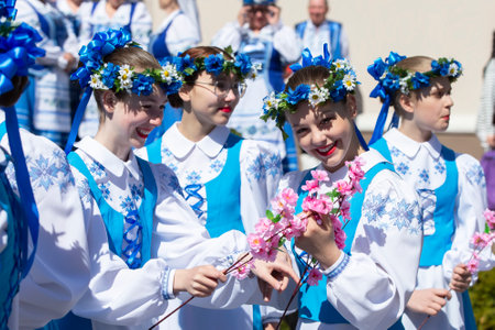 April 28, 2022. Belarus. Gomil region. Holiday of Slavic cultures. A group of young Belarusian women in ethnic costumes.Slavic women in national clothes.のeditorial素材