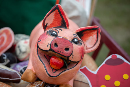 Funny piggy bank pig's face is pink with an open mouth.の写真素材