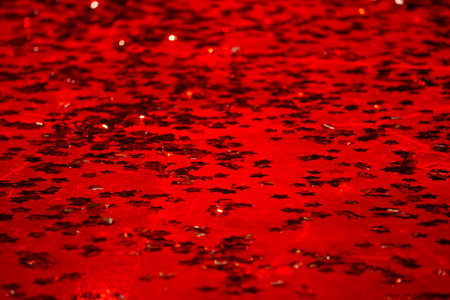 Red festive background with sparkles.の写真素材
